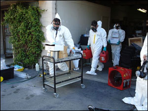 Law Enforcement Cleans Pill Lab Caption