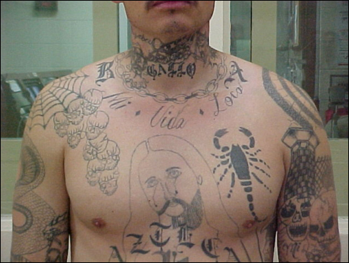 A Barrio Azteca gang member's tattoos.